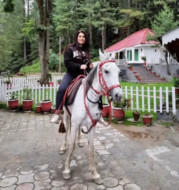 mahera-enjoying-a-ride-on-a-horse